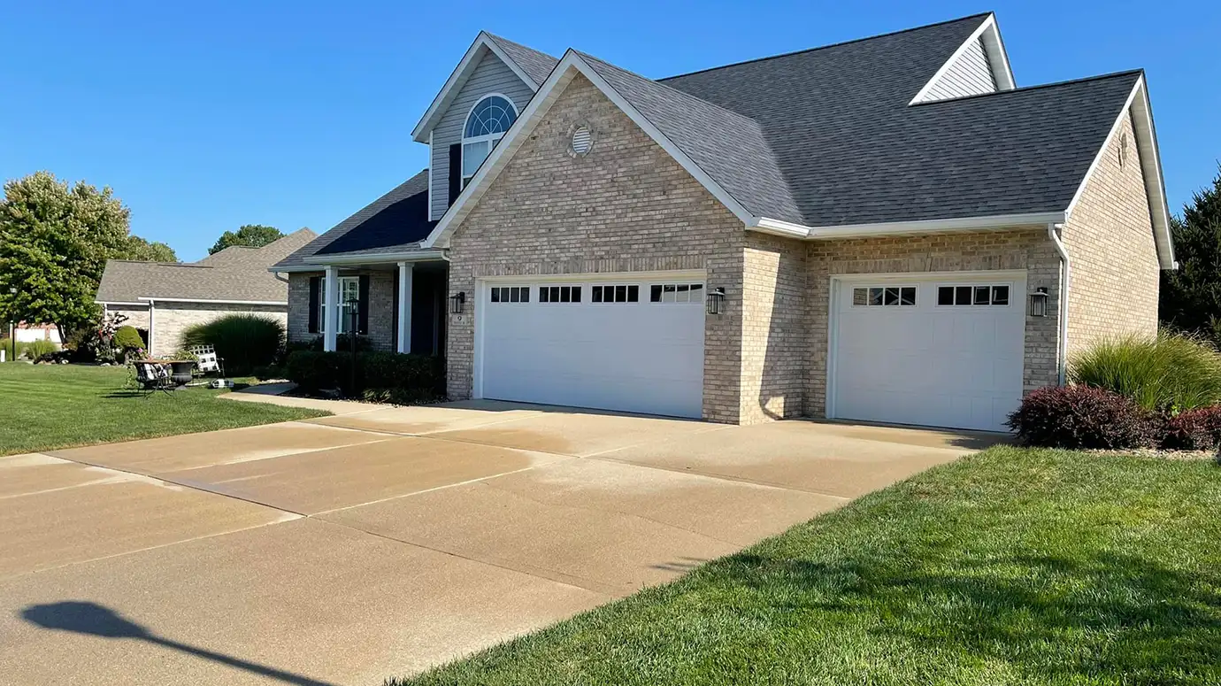 residential driveway professionally cleaned by power washing company near edwardsville illinois