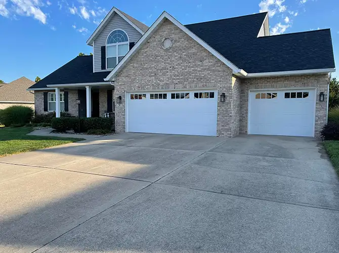 concrete walkway and patio in need of pressure washing services collinsville illinois